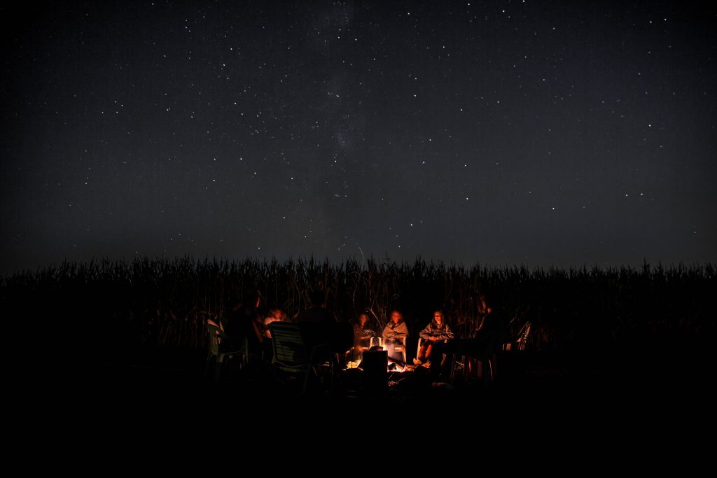 Stories being shared around a campfire to entertain and engage